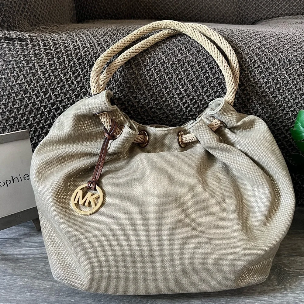 Michael Kors Marina Gathered Drawstring Gold Metallic Shimmer Hobo Shoulder Bag.